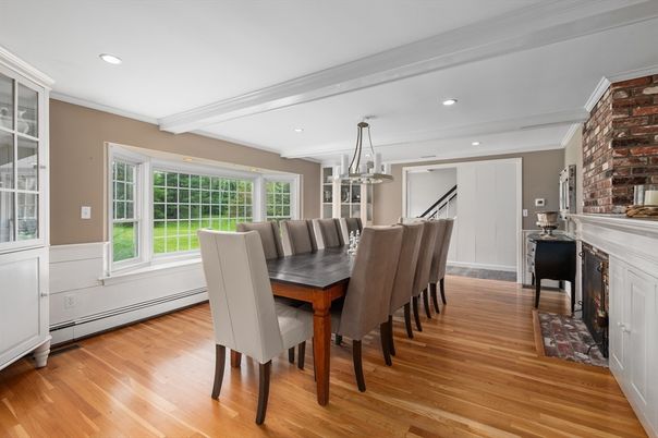 Dining room, Fireplace, Interior, Pendant Lights, Recessed Lighting, Stone Walls, Wood Texture Flooring