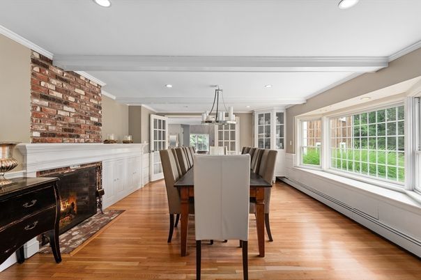 Dining room, Fireplace, Interior, Pendant Lights, Recessed Lighting, Stone Walls, Wood Texture Flooring