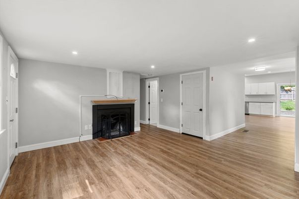 Empty room, Fireplace, Interior, Recessed Lighting, Wood Texture Flooring