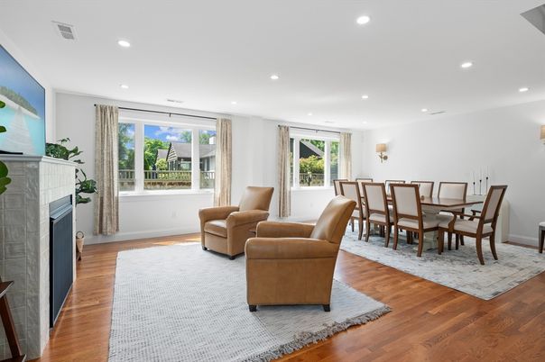Dining room, Fireplace, Interior, Living room, Recessed Lighting, Wood Texture Flooring
