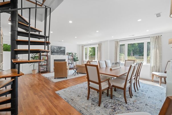 Dining room, Fireplace, Interior, Living room, Recessed Lighting, Wood Texture Flooring