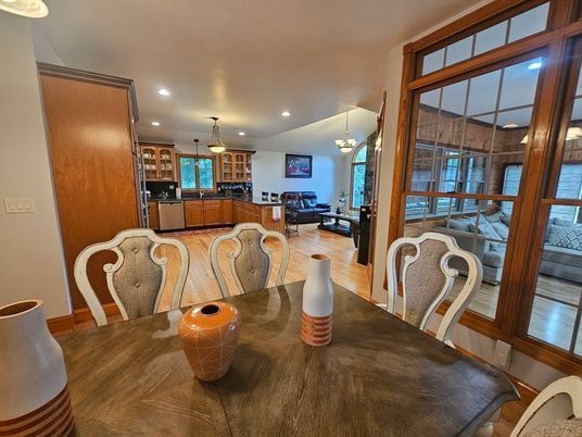 Chandelier, Dining room, Interior, Kitchen, Living room, Pendant Lights, Recessed Lighting, Wood Texture Flooring