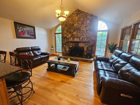 Fireplace, Interior, Living room, Pendant Lights, Stone Walls, Wood Texture Flooring