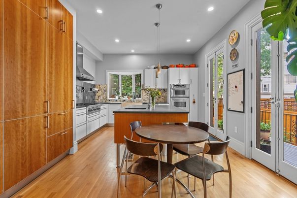 Dining room, Interior, Kitchen, Pendant Lights, Recessed Lighting, Stainless Steel Appliances, Wood Texture Flooring