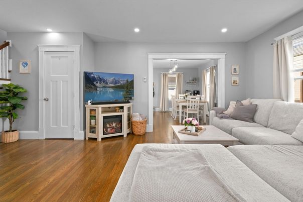 Dining room, Fireplace, Interior, Living room, Pendant Lights, Recessed Lighting, Wood Texture Flooring