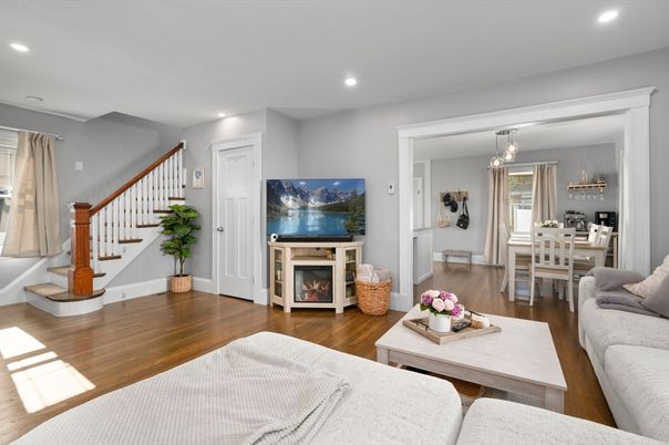 Dining room, Fireplace, Interior, Living room, Pendant Lights, Recessed Lighting, Wood Texture Flooring