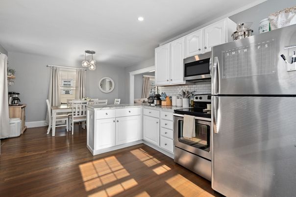 Dining room, Interior, Kitchen, Recessed Lighting, Stainless Steel Appliances, Wood Texture Flooring