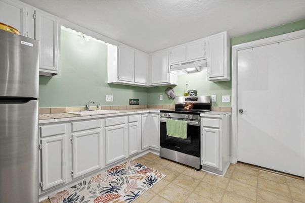 Interior, Kitchen, Stainless Steel Appliances, Tile Countertops