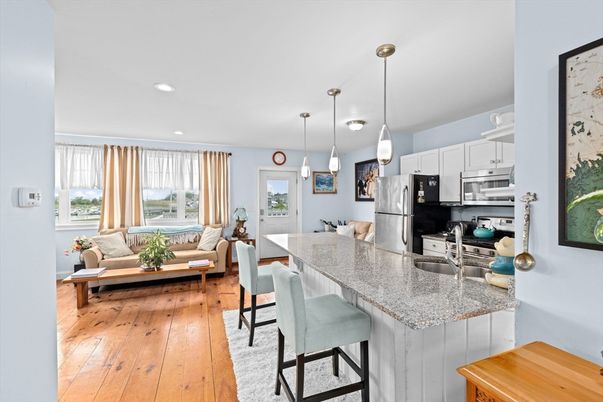Dining room, Interior, Kitchen, Living room, Pendant Lights, Recessed Lighting, Stainless Steel Appliances, Wood Texture Flooring