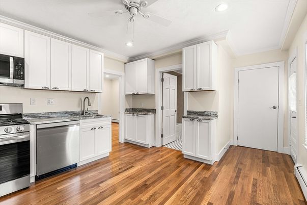 Interior, Kitchen, Recessed Lighting, Stainless Steel Appliances, Wood Texture Flooring