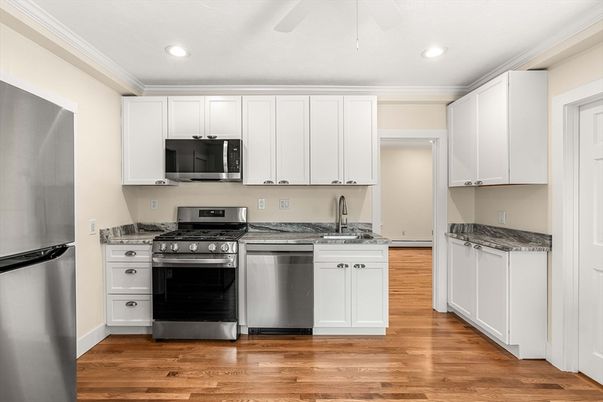 Interior, Kitchen, Recessed Lighting, Stainless Steel Appliances, Wood Texture Flooring