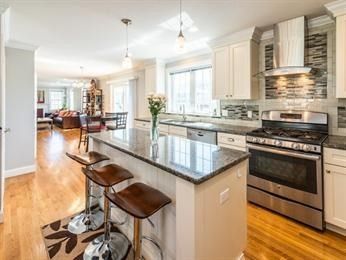Chandelier, Dining room, Interior, Kitchen, Living room, Pendant Lights, Recessed Lighting, Stainless Steel Appliances, Wood Texture Flooring