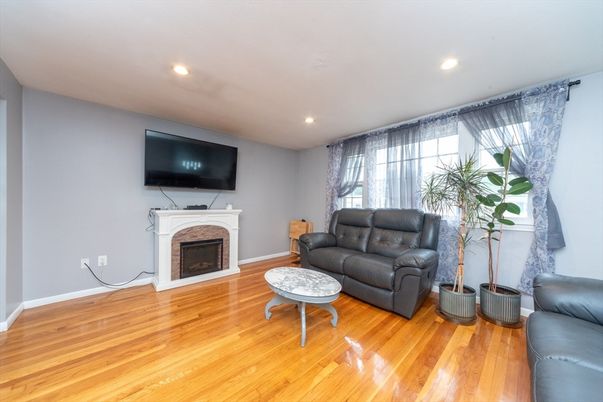 Fireplace, Interior, Living room, Recessed Lighting, Wood Texture Flooring