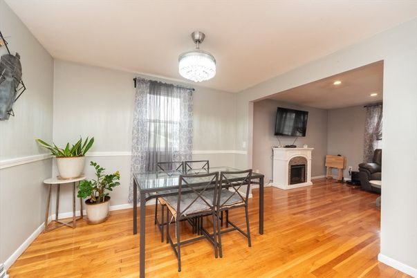 Chandelier, Dining room, Fireplace, Interior, Recessed Lighting, Wood Texture Flooring