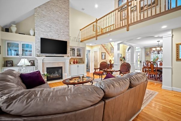 Chandelier, Dining room, Fireplace, Interior, Living room, Recessed Lighting, Stone Walls, Wood Texture Flooring