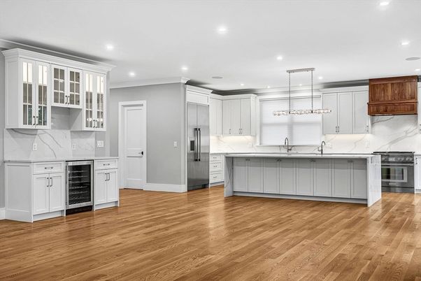 Interior, Kitchen, Marble Walls, Pendant Lights, Recessed Lighting, Stainless Steel Appliances, Wood Texture Flooring