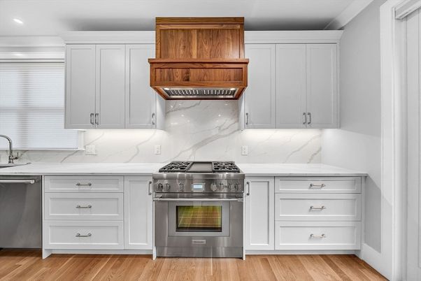 Interior, Kitchen, Marble Walls, Recessed Lighting, Stainless Steel Appliances, Wood Texture Flooring