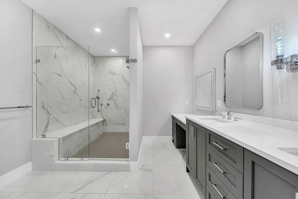 Bathroom, Dual Sink Vanities, Glass Shower, Interior, Marble, Marble Walls, Recessed Lighting