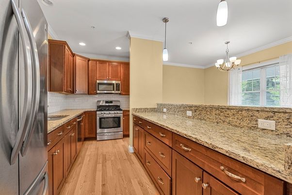 Chandelier, Interior, Kitchen, Pendant Lights, Recessed Lighting, Stainless Steel Appliances, Wood Texture Flooring