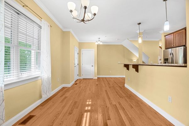 Chandelier, Empty room, Interior, Kitchen, Pendant Lights, Stainless Steel Appliances, Wood Texture Flooring