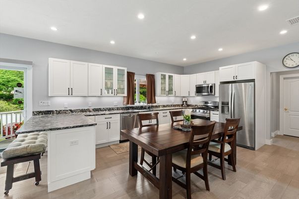 Dining room, Interior, Kitchen, Recessed Lighting, Stainless Steel Appliances, Wood Texture Flooring