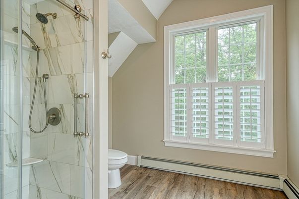 Bathroom, Glass Shower, Interior, Marble Walls, Wood Texture Flooring