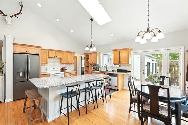 Chandelier, Dining room, Interior, Kitchen, Pendant Lights, Recessed Lighting, Stainless Steel Appliances, Wood Texture Flooring