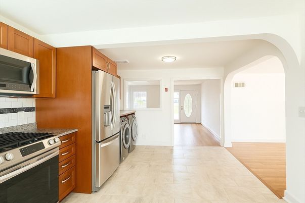 Interior, Kitchen, Stainless Steel Appliances, Washer, Wood Texture Flooring