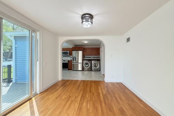 Empty room, Interior, Kitchen, Stainless Steel Appliances, Wood Texture Flooring