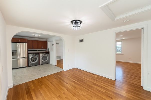 Empty room, Interior, Kitchen, Stainless Steel Appliances, Wood Texture Flooring