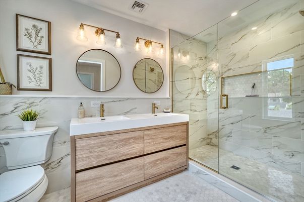 Bathroom, Dual Sink Vanities, Glass Shower, Interior, Marble Walls, Recessed Lighting