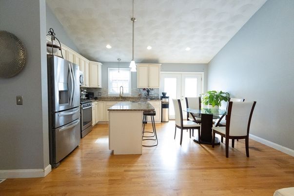 Dining room, Interior, Kitchen, Pendant Lights, Recessed Lighting, Stainless Steel Appliances, Wood Texture Flooring