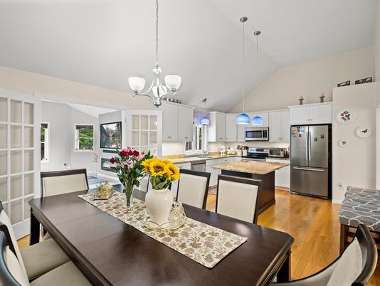 Chandelier, Dining room, Interior, Kitchen, Pendant Lights, Stainless Steel Appliances, Wood Texture Flooring