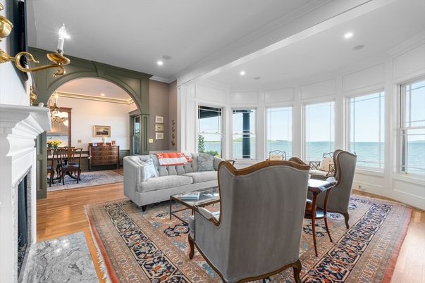 Dining room, Fireplace, Interior, Living room, Recessed Lighting, Water, Wood Texture Flooring