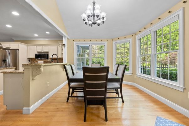 Chandelier, Dining room, Interior, Kitchen, Recessed Lighting, Stainless Steel Appliances, Wood Texture Flooring