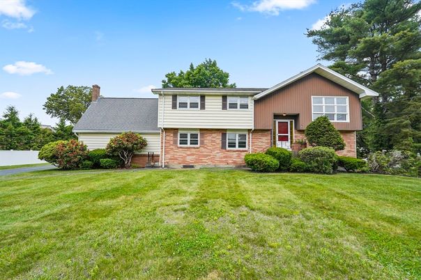 Attached, Backyard, Exterior, Facade, Brick Facade, Raised Ranch