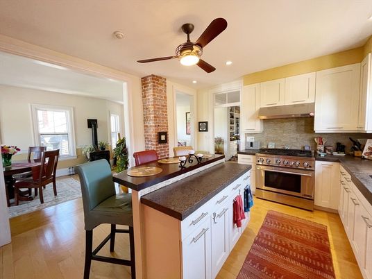 Dining room, Interior, Kitchen, Recessed Lighting, Stainless Steel Appliances, Stone Walls, Wood Texture Flooring