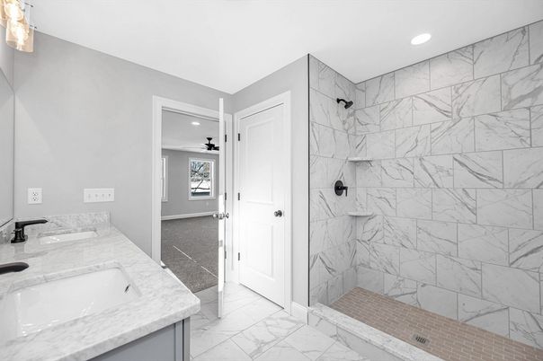 Bathroom, Dual Sink Vanities, Interior, Marble, Marble Walls, Recessed Lighting