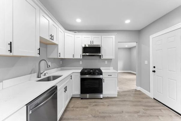 Interior, Kitchen, Recessed Lighting, Stainless Steel Appliances, Wood Texture Flooring