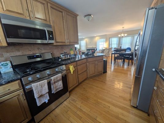 Chandelier, Dining room, Interior, Kitchen, Stainless Steel Appliances, Wood Texture Flooring