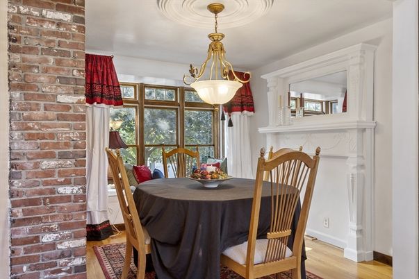 Dining room, Fireplace, Interior, Pendant Lights, Stone Walls, Wood Texture Flooring