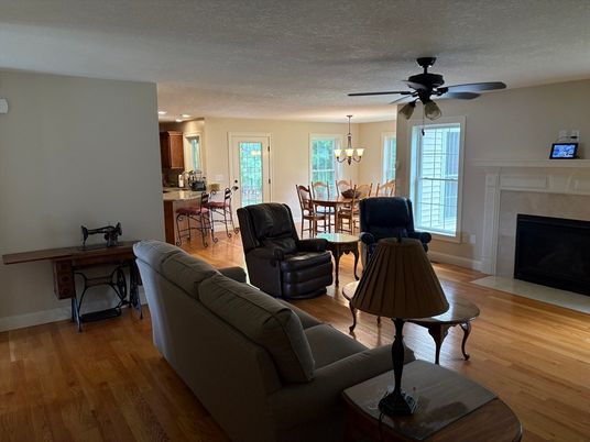 Chandelier, Dining room, Fireplace, Interior, Living room, Wood Texture Flooring