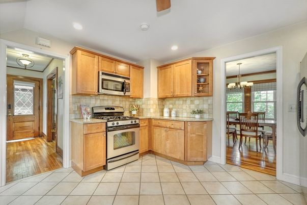 Chandelier, Dining room, Interior, Kitchen, Recessed Lighting, Stainless Steel Appliances, Wood Texture Flooring