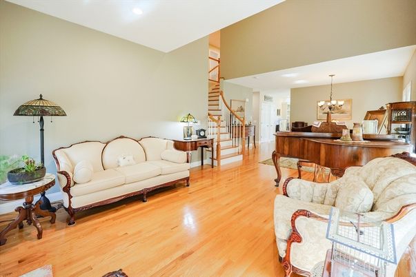 Chandelier, Dining room, Interior, Living room, Piano, Recessed Lighting, Wood Texture Flooring