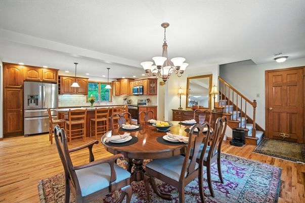 Chandelier, Dining room, Interior, Kitchen, Pendant Lights, Recessed Lighting, Stainless Steel Appliances, Wood Texture Flooring