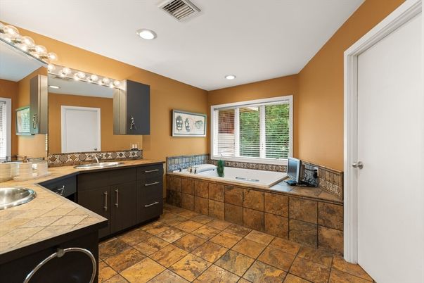 Bathroom, Dual Sink Vanities, Interior, Recessed Lighting, Tile Countertops