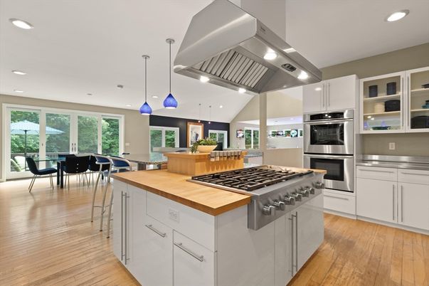 Dining room, Interior, Kitchen, Pendant Lights, Recessed Lighting, Stainless Steel Appliances, Wood Texture Flooring