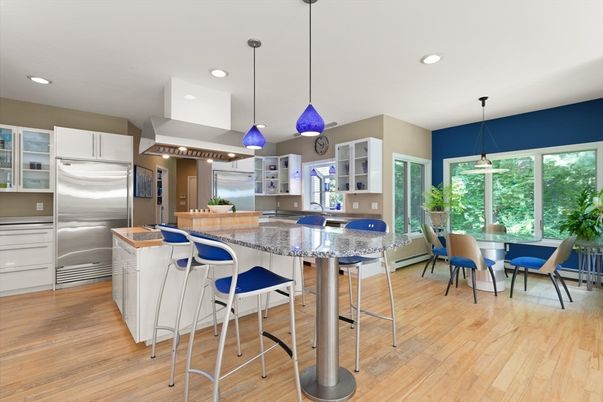 Dining room, Interior, Kitchen, Pendant Lights, Recessed Lighting, Stainless Steel Appliances, Wood Texture Flooring