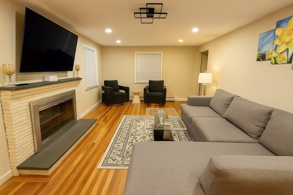 Fireplace, Interior, Living room, Recessed Lighting, Wood Texture Flooring