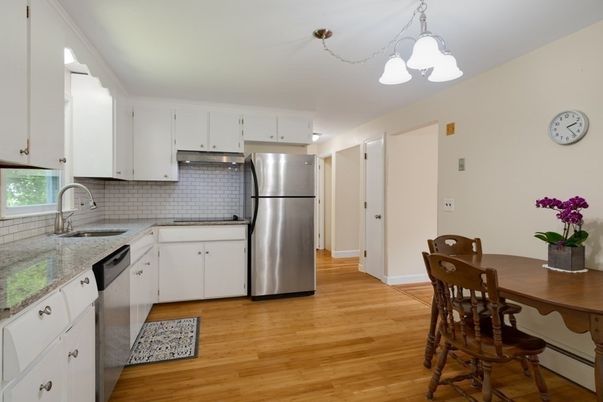 Dining room, Interior, Kitchen, Pendant Lights, Stainless Steel Appliances, Wood Texture Flooring